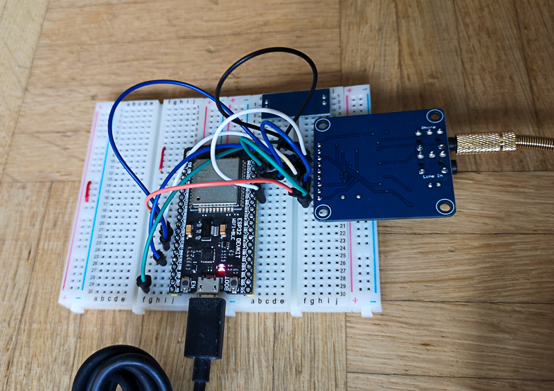 A photograpgh of the breadboard with an ESP32 devkit connected to the VS1003 board